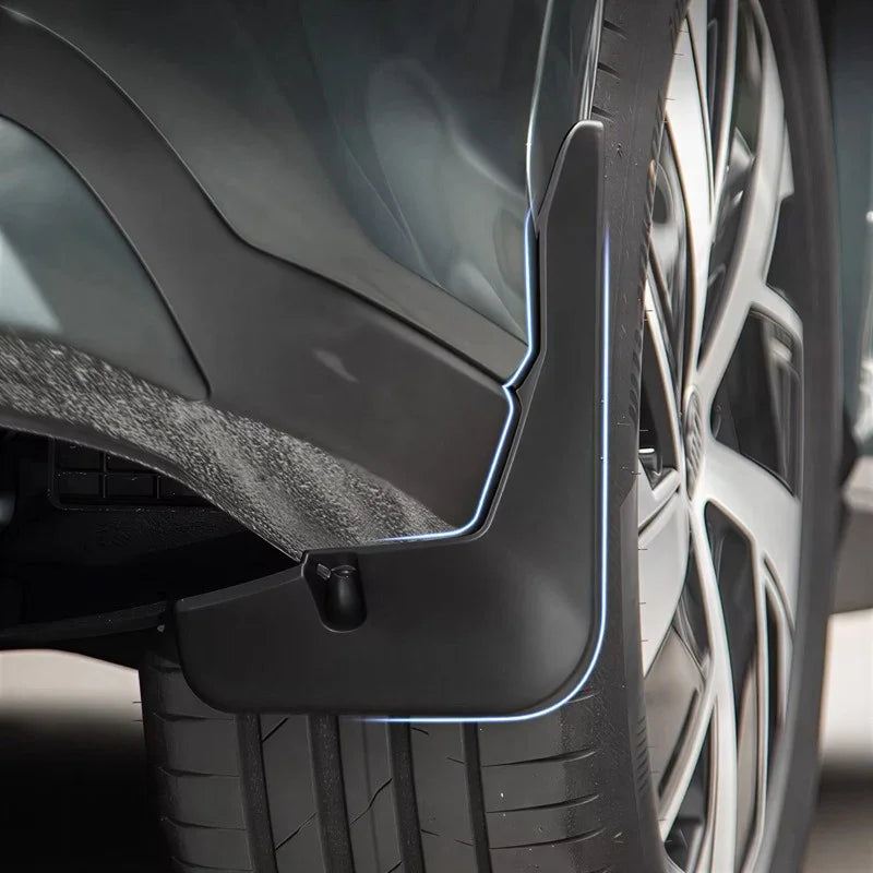 Black matte durable mud flap with sleek contoured edges for BYD vehicle protection.