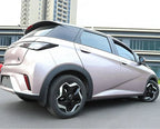 Light pink BYD electric compact SUV featuring black trim and stylish two-tone alloy wheels.