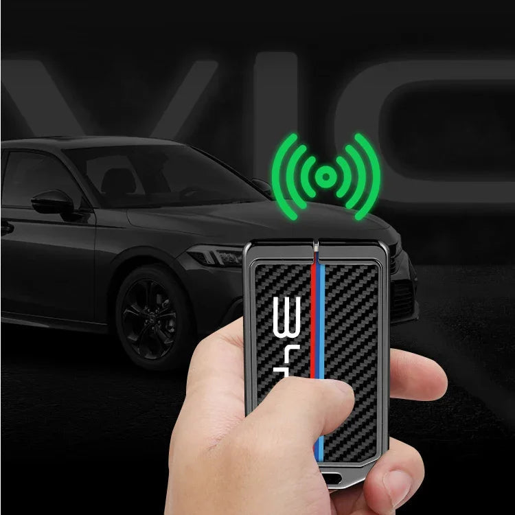 Black carbon fiber texture smart key fob with red and blue racing stripes.