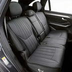 Premium black leather custom car seat covers with elegant ribbed stitching for interior protection.
