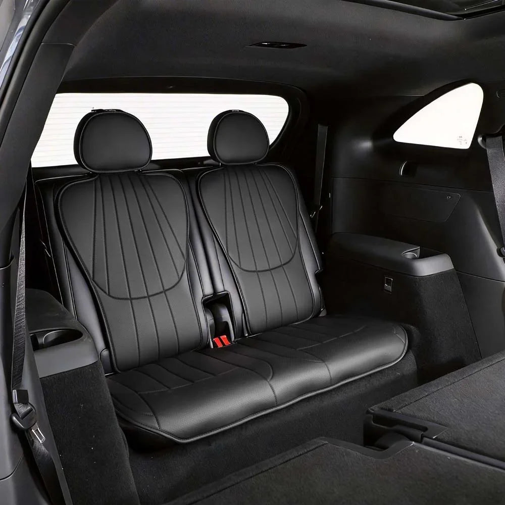 Professional black leather rear car seat covers with vertical stitching for luxury interior protection