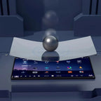 Clear tempered glass screen protector for car display, showcasing impact resistance with a metal ball.