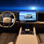 Tan leather car interior featuring a digital dashboard and large touchscreen infotainment display.