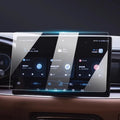 Clear tempered glass screen protector for BYD car infotainment system to prevent scratches.