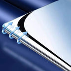 Close-up of a silver metallic car accessory edge with blue protective coating arrows.