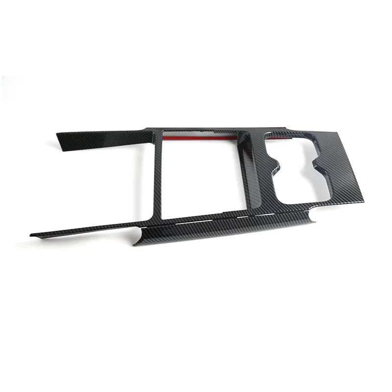 Professional carbon fiber center console trim panel in sleek black for BYD car interior.