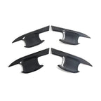Set of four carbon fiber black automotive exterior trim accessories