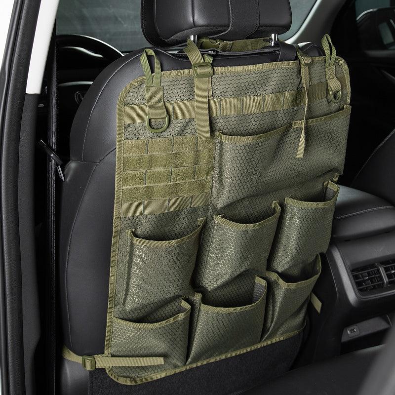 Olive green tactical car seat organizer made of durable honeycomb fabric with MOLLE system.