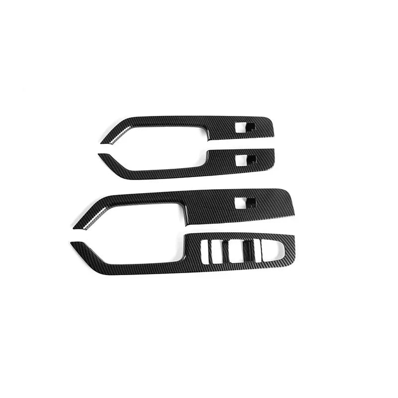 Black carbon fiber texture interior trim accessories for BYD car door panels.