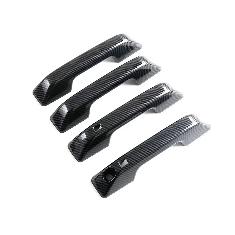 Set of four car door handle covers with a professional black carbon fiber weave finish