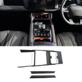 Carbon fiber texture interior trim kit in black for BYD center console and dashboard.