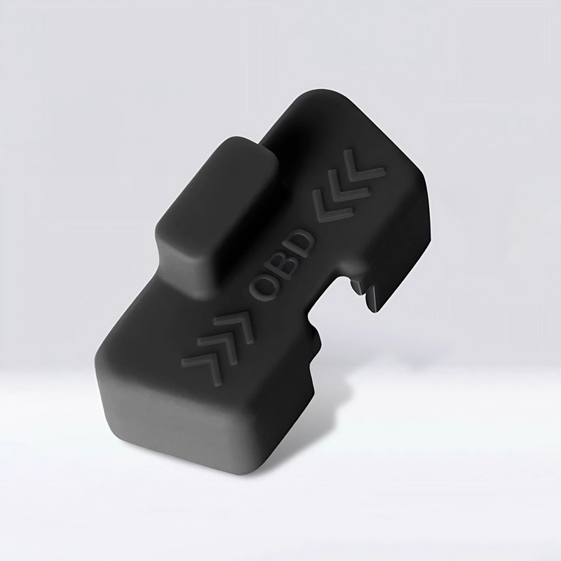 Black silicone OBD port dust cover protector for car diagnostic socket maintenance.