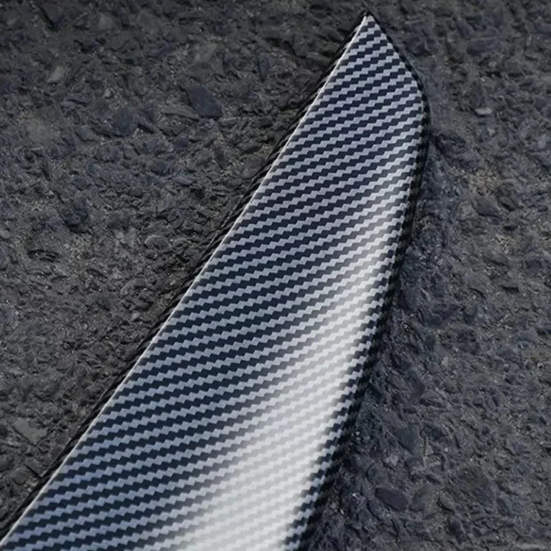 Carbon fiber textured black automotive trim piece