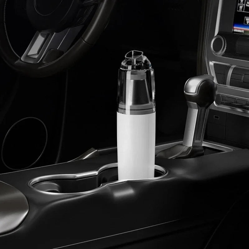 Sleek white and clear plastic car air purifier in a vehicle's center console cup holder.