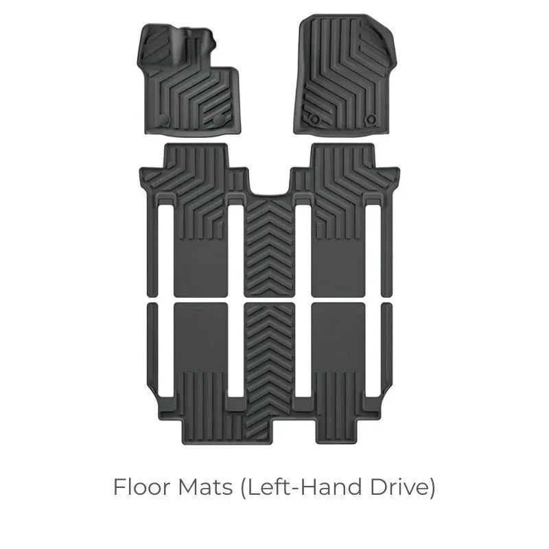Black heavy-duty rubber floor mats set with anti-slip textured pattern for left-hand drive vehicles.