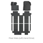 Black heavy-duty rubber floor mats set with anti-slip textured pattern for left-hand drive vehicles.