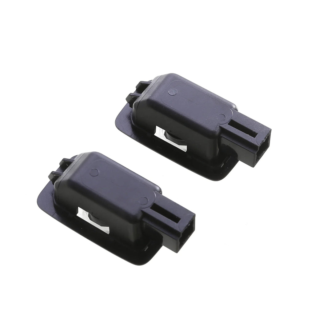 Two durable black plastic automotive clips with mounting bases