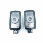 Pair of black automotive LED signal lights with clear transparent lenses.