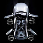 Top view of a silver Denza concept car with open gull-wing doors on a black background.