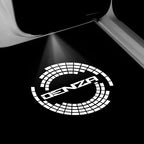 Illuminated white DENZA logo projected onto a black car floor mat surface.