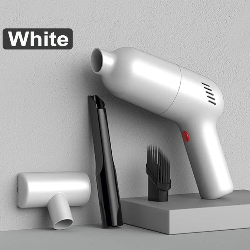 White matte-finish hair dryer with black nozzle attachments on a grey textured background.