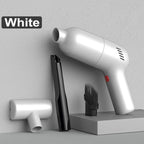White matte-finish hair dryer with black nozzle attachments on a grey textured background.