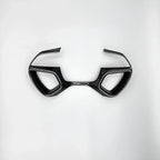 Black carbon fiber texture interior trim accessory for BYD car dashboard.