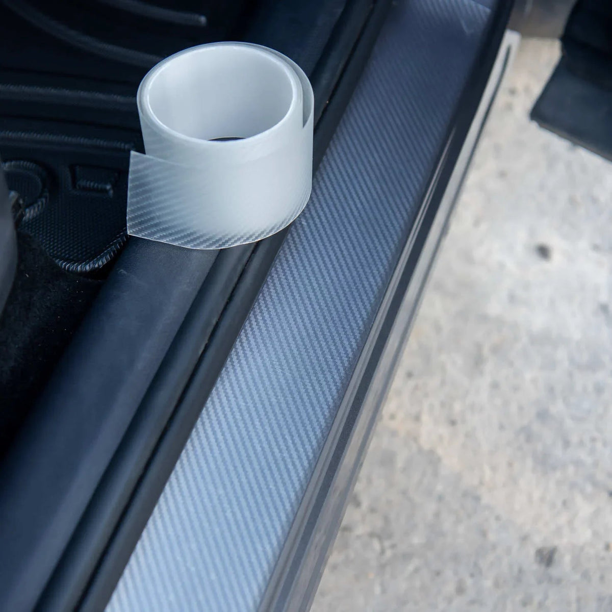 Roll of transparent carbon fiber pattern car door sill protection film