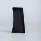 Black textured non-slip tray liner made of durable composite material for car interior protection.
