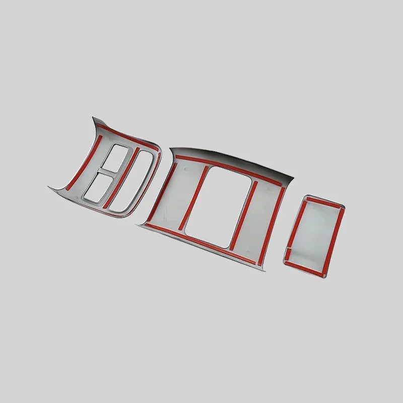 Chrome and red finished BYD car emblem letters on a grey background