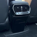 Black carbon fiber pattern rear air vent cover for BYD car interior protection.