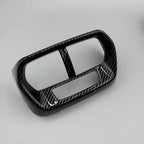 Glossy black carbon fiber patterned interior trim decorative frame for car dashboard.