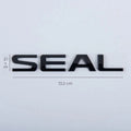 Glossy black SEAL emblem badge, 13.2 cm wide, premium metallic finish for car exterior.
