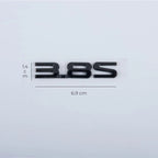 Black 3.8S glossy emblem badge, 6.9cm wide, for car exterior styling.