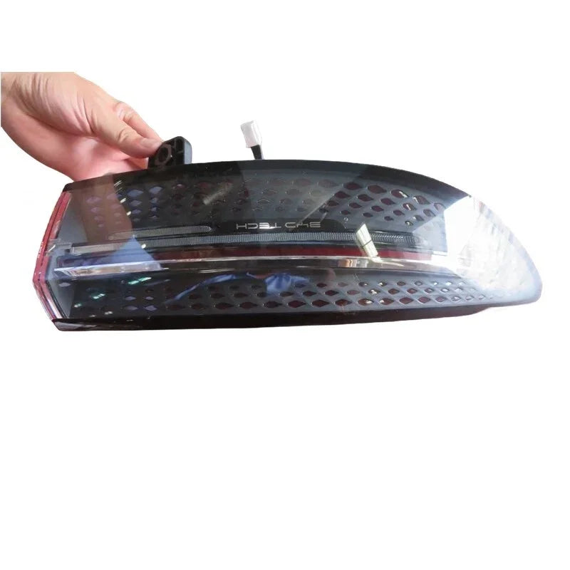 Smoked black textured LED tail light assembly for BYD vehicle enhancement.