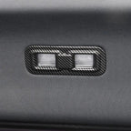 Carbon fiber texture window switch panel in sleek black for car interior enhancement.