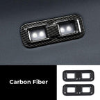 Black carbon fiber window switch trim covers for BYD car interior accessories.