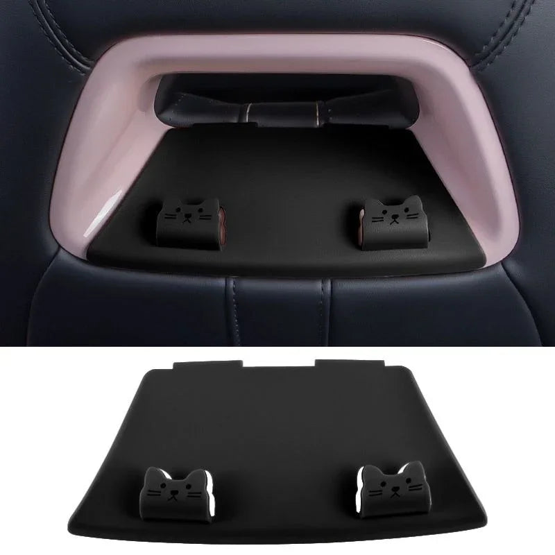 Black silicone car seat organizer with cute pink cat-shaped cable holders.