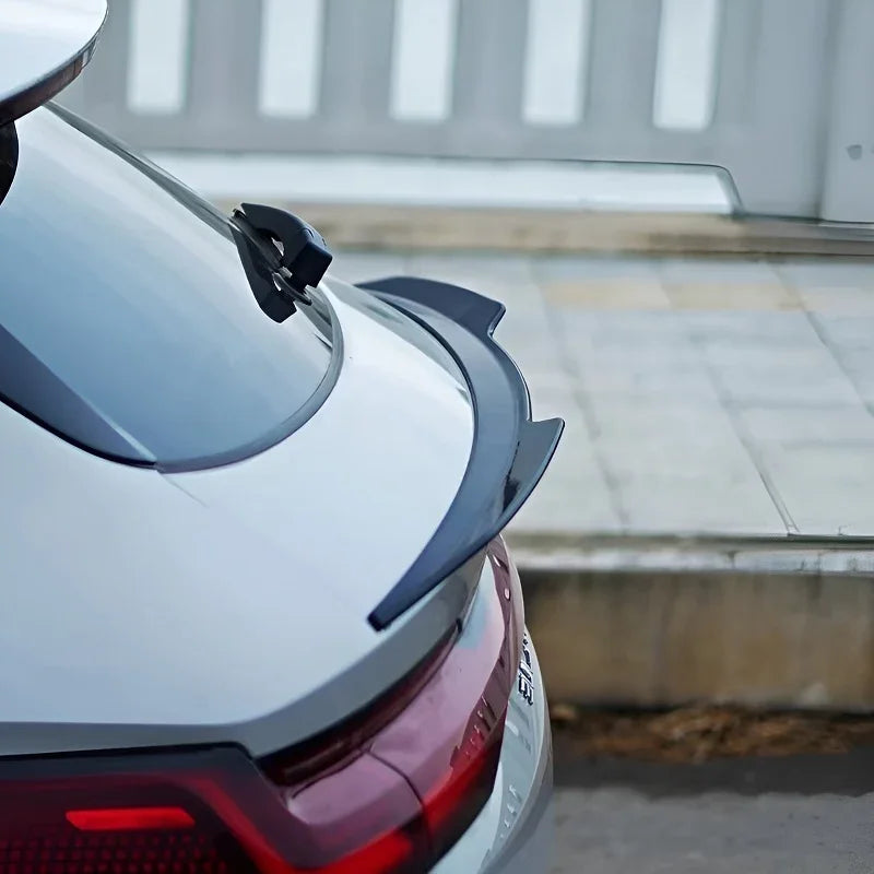 Glossy black aerodynamic rear spoiler for BYD, made of durable high-quality composite material.