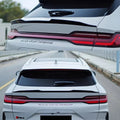 Sleek black carbon fiber rear spoiler for BYD, featuring a high-gloss aerodynamic design.