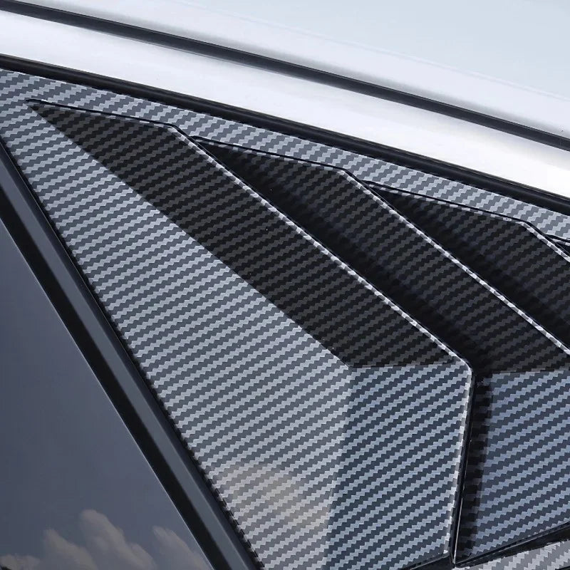 Carbon fiber texture black window visors for BYD, featuring a sleek aerodynamic design.