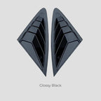 Glossy black aerodynamic side vent covers made of durable high-shine material.