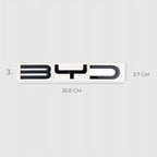 Black BYD logo emblem, 25.8cm wide, featuring a sleek glossy finish on a white background.