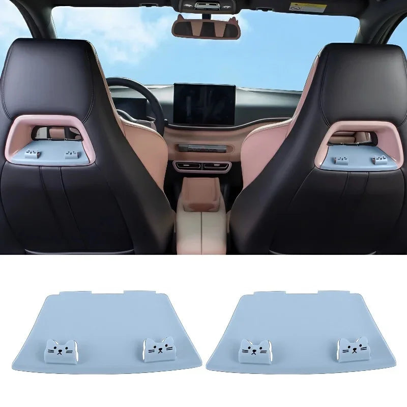 Set of two light blue cat-shaped seat headrest hooks for car interior protection.