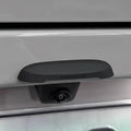 Matte black Rosyclouds rear-view backup camera mounted on a silver vehicle bumper.