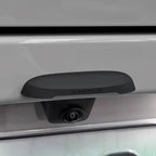 Matte black Rosyclouds rear-view backup camera mounted on a silver vehicle bumper.