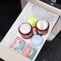 White durable plastic car center console organizer drawer holding drinks and snacks.