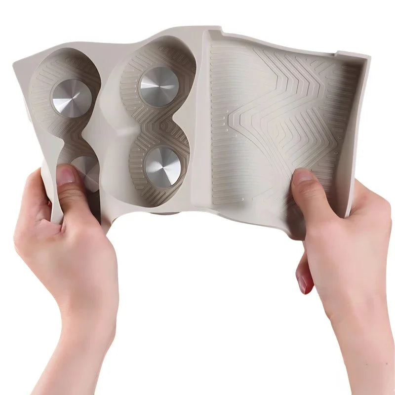 Beige silicone car cup holder organizer with non-slip textured surface and silver metallic accents.