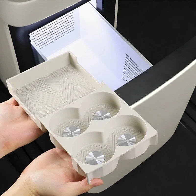 Beige premium organizer tray with textured surface and four circular compartments for car storage.