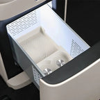 Cream white patterned silicone center console organizer tray for BYD car interior storage.